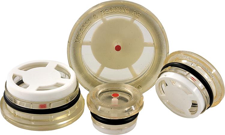 Press-fit oil sight glasses